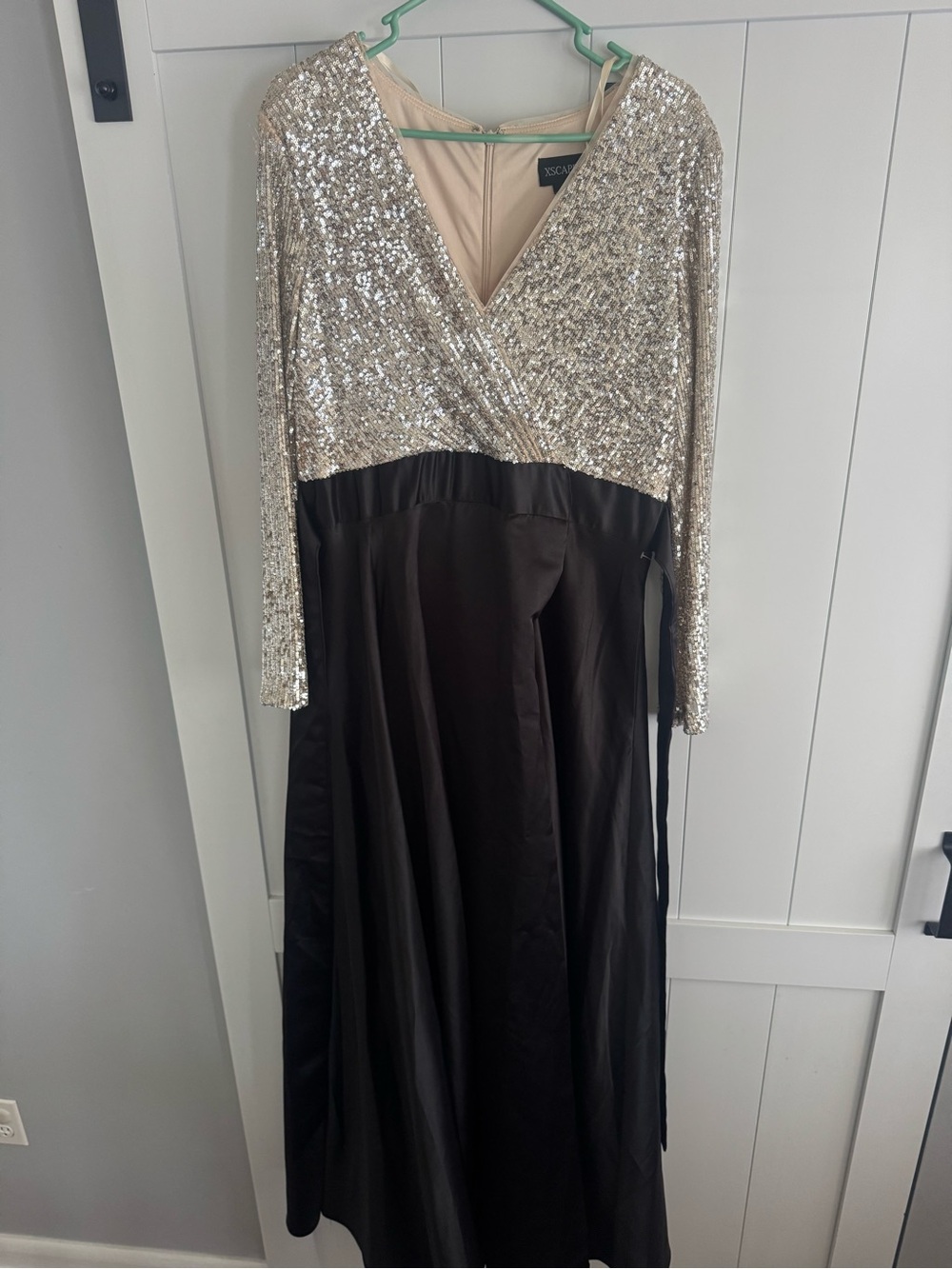 Xscape Silver Sequin Bodice Long Sleeve Gown with Black Skirt